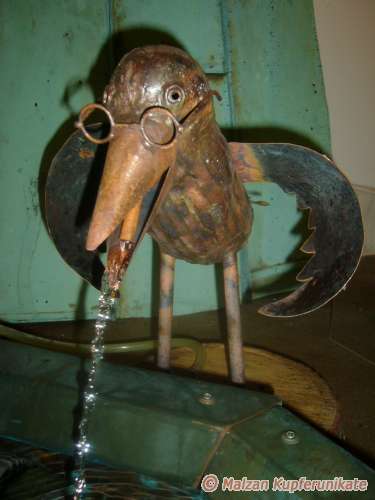 wasserspeiender Rabe